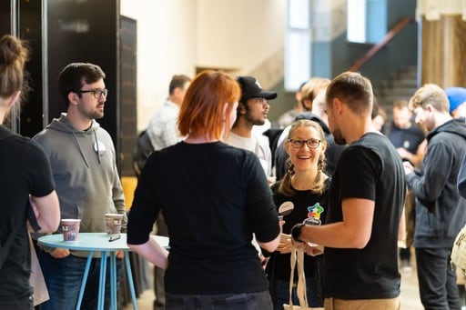 A group of people enjoying a coffee during a break