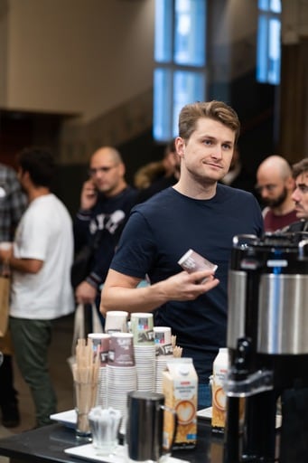 Getting a cup of coffee in the foyer