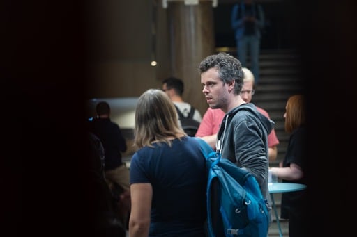 Two people in the foyer