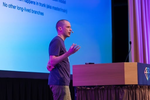 Vesa Vänskä presents, slides in the background