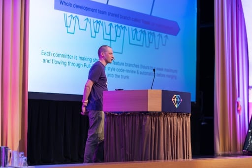 Vesa Vänskä presents, slides in the background